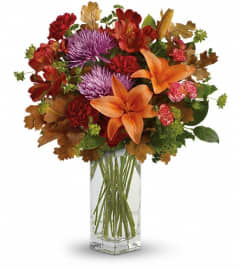 Teleflora's Fall Brights Bouquet. An arrangement by Pompano Beach Floral.