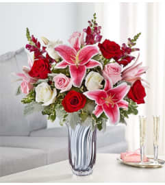 Radiant Devotion. An arrangement by Garden of Eden Floral.