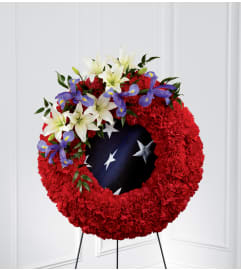 The FTD® To Honor One's Country™ Easel Wreath. An arrangement by Mystic Garden Floral.