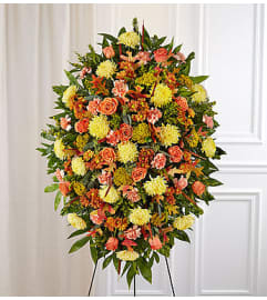 Sympathy Standing Spray in Fall Colors. An arrangement by Blessing and Blooms Florist.