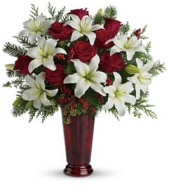 Holiday Magic. An arrangement by Wasaga Flowers.
