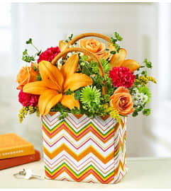 Handbag of Blooms™. An arrangement by Blessing and Blooms Florist.