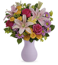 Teleflora's Perfectly Pastel. An arrangement by Devine Orchid.