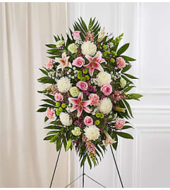 Pastel Sympathy Standing Spray. An arrangement by Blessing and Blooms Florist.