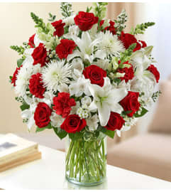 Sincerest Sorrow - Red and White. An arrangement by Graceland Florist.