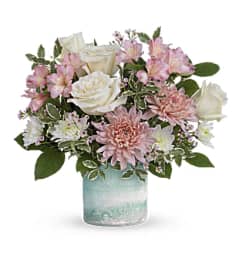 Teleflora's Sweetly You Bouquet. An arrangement by Marivel's Florist and Gifts.