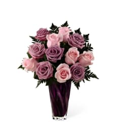 The FTD® Royal Treatment™ Rose Bouquet 2015. An arrangement by Mystic Garden Floral.