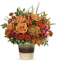 Teleflora's Autumn Gifts Bouquet. An arrangement by Marivel's Florist and Gifts.