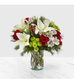 The FTD® Christmas Spirit™ Bouquet. An arrangement by Sunrise Floral and Gifts. The FTD® Christmas Spirit™ Bouquet. An arrangement by Sunrise Floral and Gifts.
