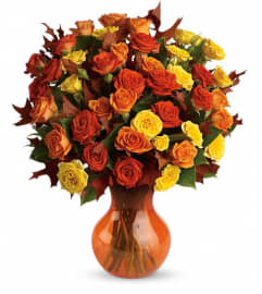 Teleflora's Fabulous Fall Roses. An arrangement by Marivel's Florist and Gifts.