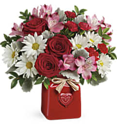 Teleflora's Country Sweetheart Bouquet. An arrangement by Devine Orchid.
