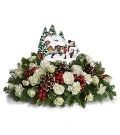 Thomas Kinkade's Snow Time by Teleflora. An arrangement by Devine Orchid.
