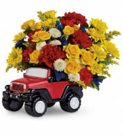 Jeep® Wrangler King Of The Road by Teleflora. An arrangement by Pompano Beach Floral.