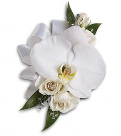 White Orchid and Rose Corsage. An arrangement by Linda's Floral Designs.