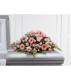 The FTD® Sweet Farewell™ Casket Spray. An arrangement by Syd Kemsley Florist.