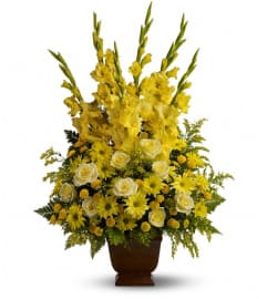 Teleflora's Sunny Memories. An arrangement by Vivian Flowers.