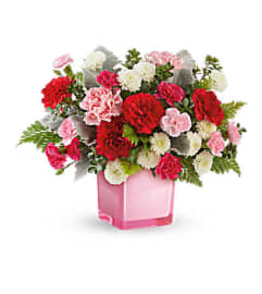 The Teleflora's Tranquil Love Bouquet. An arrangement by Marivel's Florist and Gifts.