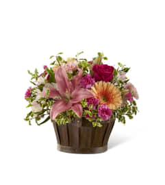 The FTD® Spring Garden® Basket. An arrangement by Mystic Garden Floral.