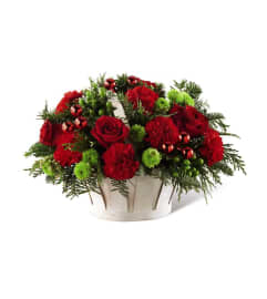 The FTD® Winter Wishes™ Basket. An arrangement by Flamingo Floral and Gifts.