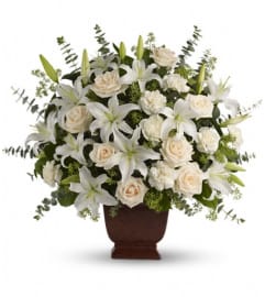 Teleflora's Loving Lilies and Roses Bouquet. An arrangement by Wasaga Flowers.
