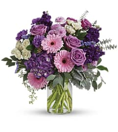 Teleflora's Magnificent Mauves Bouquet. An arrangement by Marivel's Florist and Gifts. Teleflora's Magnificent Mauves Bouquet. An arrangement by Marivel's Florist and Gifts.