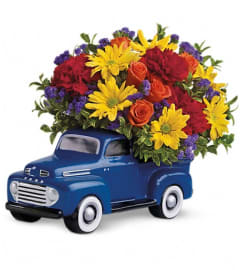 Teleflora's '48 Ford Pickup Bouquet. An arrangement by Pompano Beach Floral.