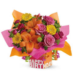 Teleflora's Rosy Birthday Present. An arrangement by Fort Lauderdale Florist.
