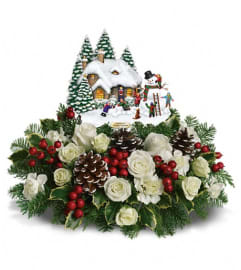 Thomas Kinkade's Snow Time by Teleflora. An arrangement by Devine Orchid.