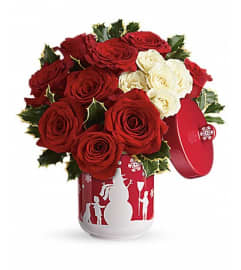 Teleflora's Roses And Holly Bouquet. An arrangement by Pompano Beach Floral.