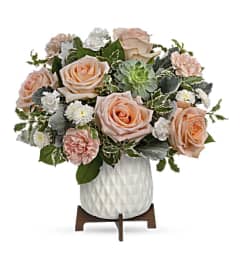 Teleflora's Mod Rose Bouquet. An arrangement by Marivel's Florist and Gifts.