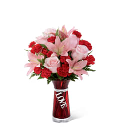 The FTD® Hold My Heart™ Bouquet 2015. An arrangement by Sandy's Florist.