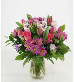 Spring Delight with Daisies. An arrangement by Flower Fantasy Inc..