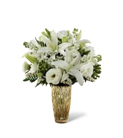 The FTD® Holiday Elegance™ Bouquet for Kathy Ireland Home 2015. An arrangement by Flamingo Floral and Gifts.