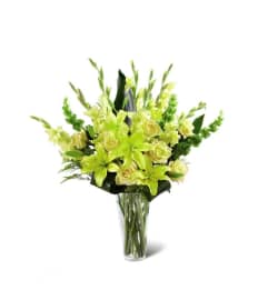 The FTD® Glowing Ray™ Bouquet. An arrangement by Mystic Garden Floral.