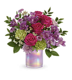 Teleflora's Lovely Lilac Bouquet 2023. An arrangement by Marivel's Florist and Gifts.