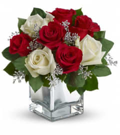 Teleflora's Snowy Night Bouquet. An arrangement by Pompano Beach Floral.