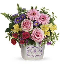 Teleflora's Backyard Butterfly Bouquet. An arrangement by Pompano Beach Floral.