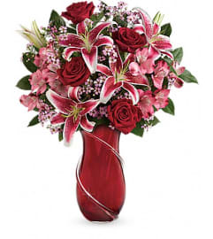 Teleflora's Wrapped With Passion Bouquet. An arrangement by Pompano Beach Floral.