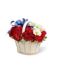 The FTD® Justice™ Basket. An arrangement by Mystic Garden Floral.