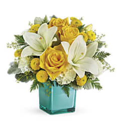 Teleflora’s Golden Laughter Bouquet. An arrangement by Vivian Flowers.