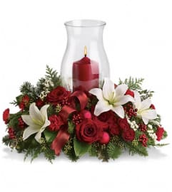 Holiday Glow Centerpiece. An arrangement by Margaret's Florist.