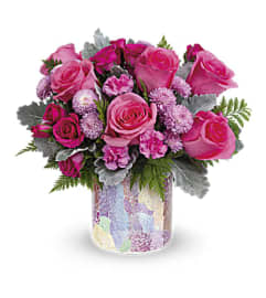 Teleflora's Playful Daisy. An arrangement by Margaret's Florist.