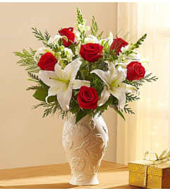 Lenox® Holiday Arrangement. An arrangement by Blessing and Blooms Florist.