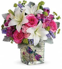 Teleflora's Garden Poetry Bouquet. An arrangement by Pompano Beach Floral.
