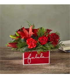 Yuletide Carol Bouquet by FTD. An arrangement by Country Cousins Flower Shop.