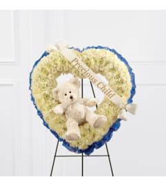 The FTD® Precious Child™ Standing Heart. An arrangement by Mystic Garden Floral.