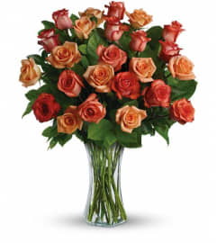 Sunrise Splendor. An arrangement by Flowers By Maria.