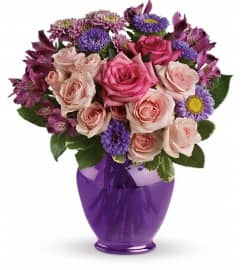 Teleflora's Purple Medley Bouquet with Roses. An arrangement by Pompano Beach Floral.