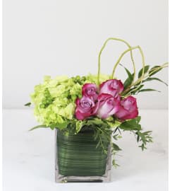 Modern Finishing Touch. An arrangement by Clark's House of Flowers.