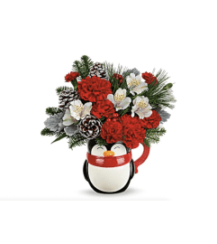 The Teleflora's Send A Hug Snowy Smile Bouquet. An arrangement by Margaret's Florist.